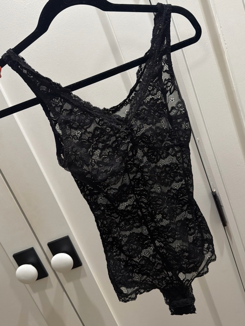 Black lace bodysuit with floral design